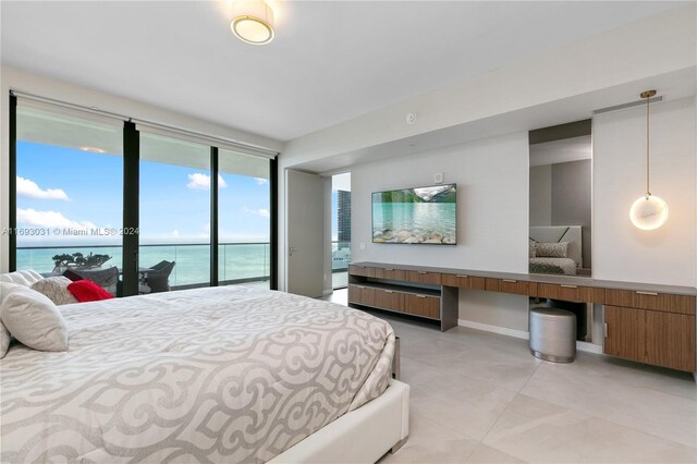 18975 Collins Ave Unit 3402, Sunny Isles Beach, FL 33160 - bedroom featuring access to outside, light tile patterned flooring, and baseboards