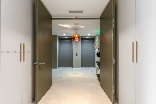 corridor featuring elevator