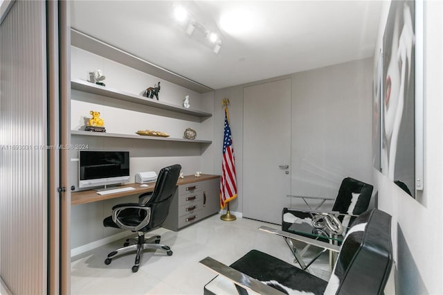 office featuring built in desk