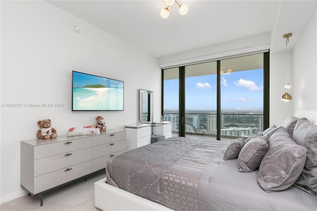 18975 Collins Ave Unit 3402, Sunny Isles Beach, FL 33160 - bedroom featuring access to exterior and light tile patterned floors