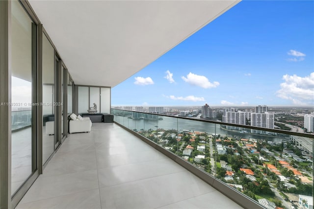 balcony featuring a water view