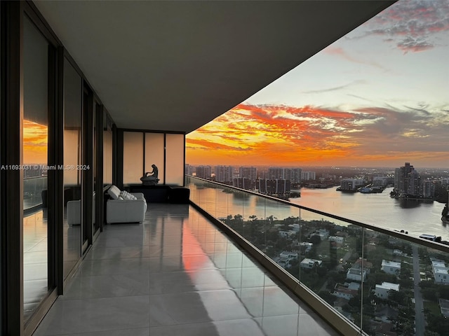 balcony at dusk with a water view