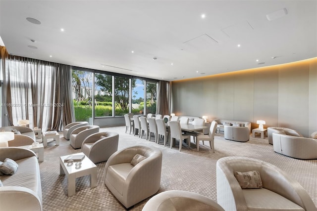 18975 Collins Ave Unit 3402, Sunny Isles Beach, FL 33160 - living area featuring light colored carpet and a wall of windows