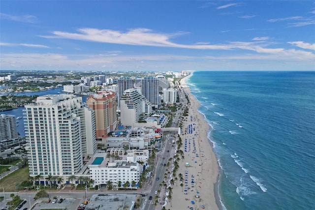 aerial view with a view of the beach and a water view