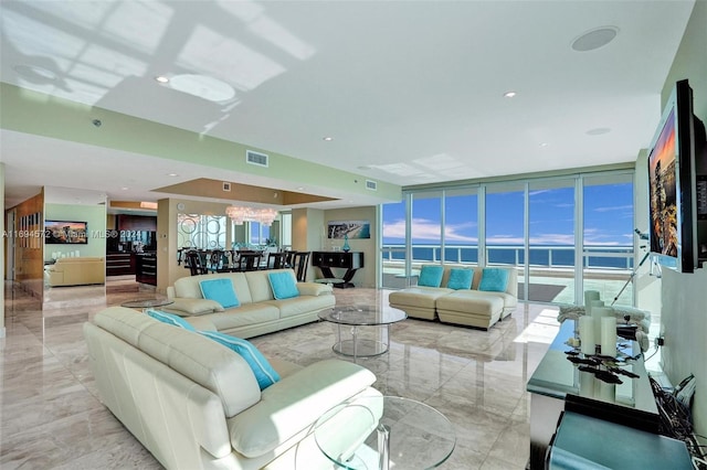 living room with floor to ceiling windows