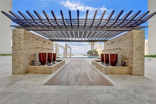 view of patio featuring a pergola