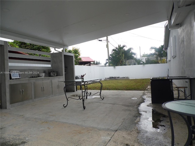 view of patio / terrace with exterior kitchen