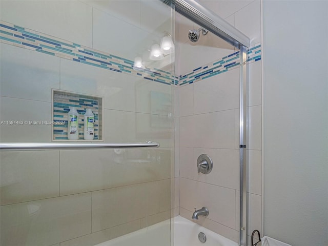 bathroom featuring enclosed tub / shower combo