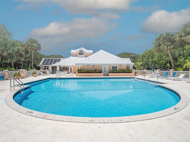 view of pool featuring a patio area