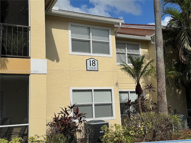 view of building exterior featuring central air condition unit