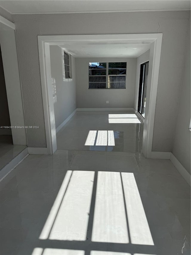 view of tiled spare room