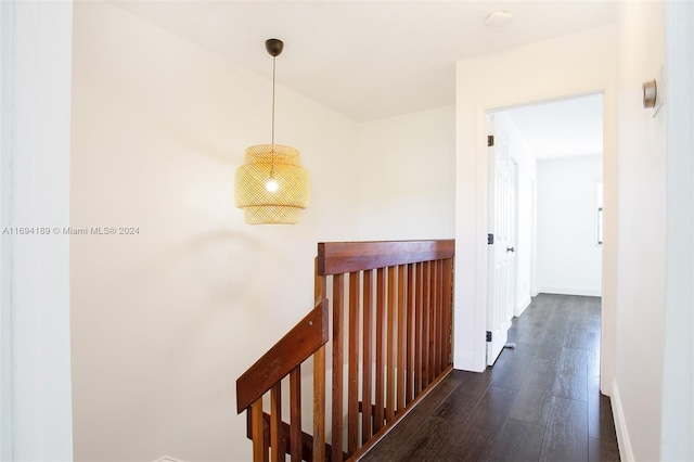 hallway featuring dark hardwood / wood-style floors