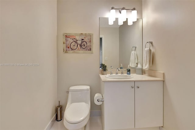 450 N Federal Hwy Unit 104N, Boynton Beach, FL 33435 - half bathroom with vanity, toilet, and baseboards