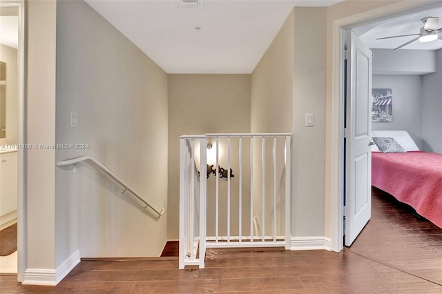 450 N Federal Hwy Unit 104N, Boynton Beach, FL 33435 - staircase featuring wood finished floors, baseboards, and a ceiling fan