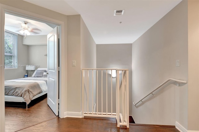 corridor featuring hardwood / wood-style flooring