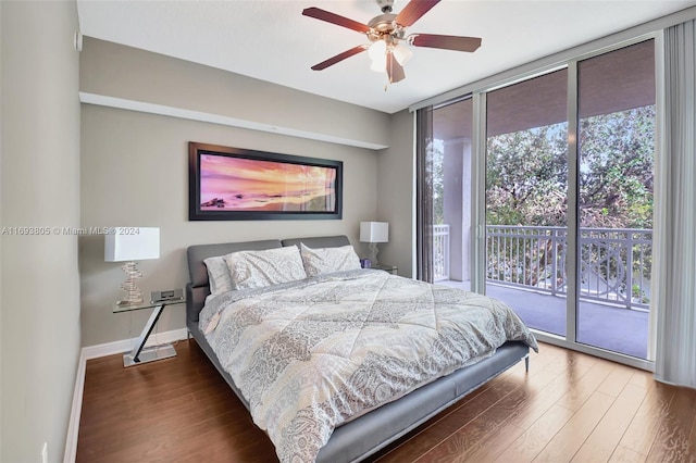 bedroom featuring access to exterior, ceiling fan, and dark hardwood / wood-style floors