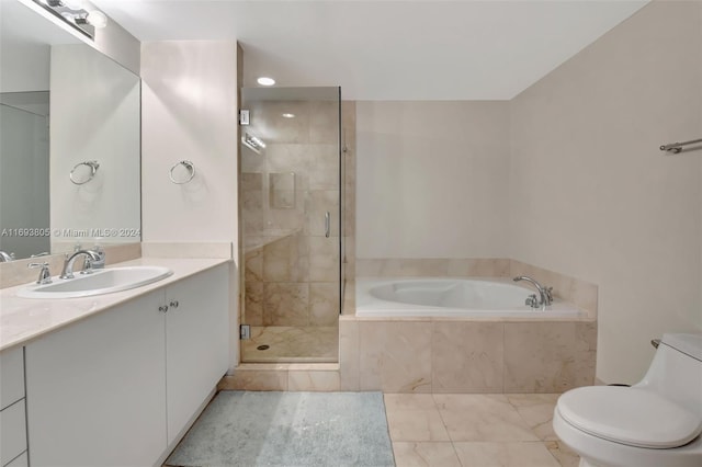 full bathroom with vanity, toilet, and shower with separate bathtub