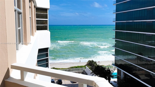 property view of water featuring a beach view