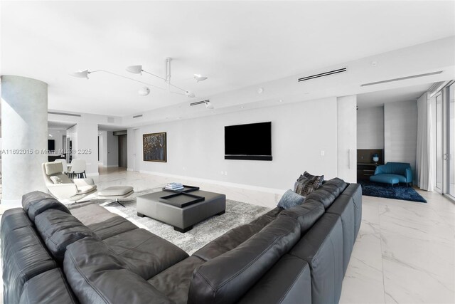 living room featuring a water view