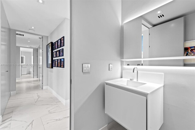 bathroom with a shower and tile walls