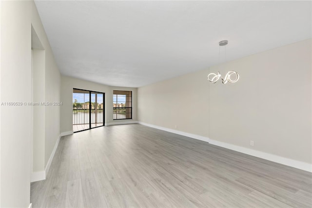 unfurnished room featuring light hardwood / wood-style flooring