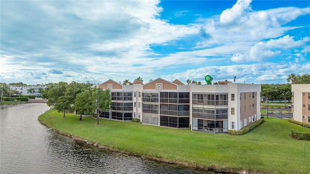 view of building exterior featuring a water view