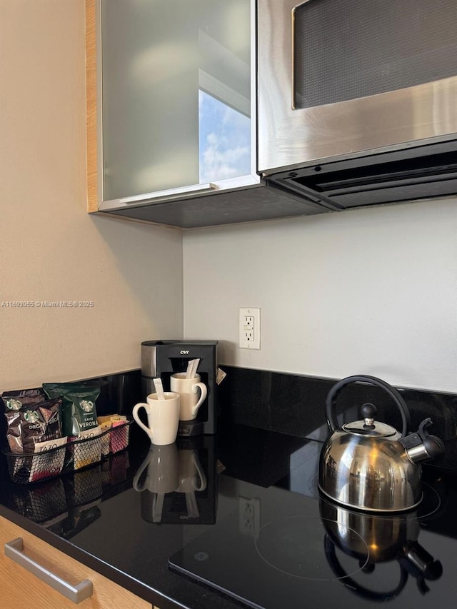 kitchen featuring black cooktop