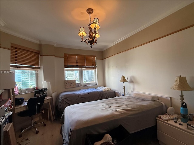 bedroom with crown molding and an inviting chandelier