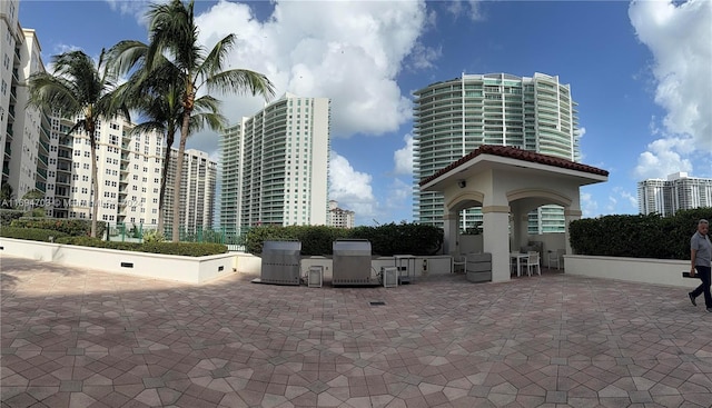 view of home's community with a patio area