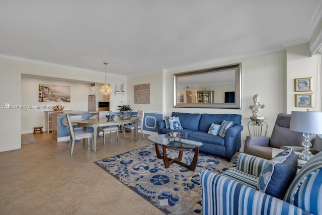 living room featuring crown molding, light tile patterned floors, and a notable chandelier