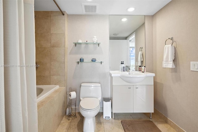 full bathroom with toilet, vanity, tile patterned floors, and shower / bath combo with shower curtain