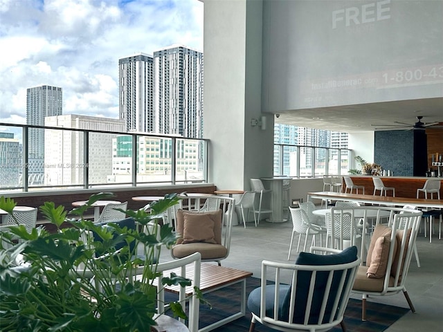 balcony featuring ceiling fan