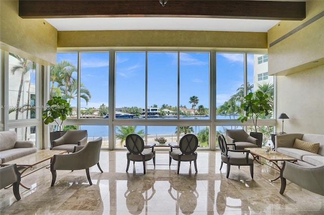 community lobby featuring a water view