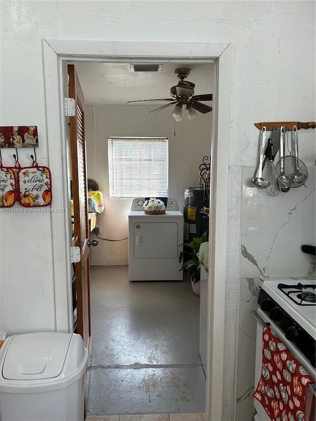 interior space with washer / dryer and ceiling fan