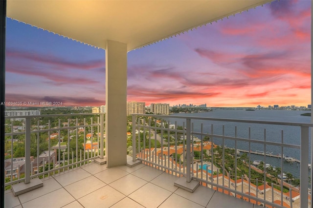 balcony at dusk with a water view