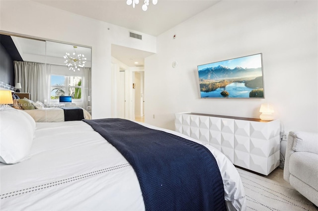 bedroom with a chandelier