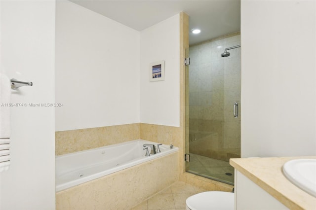 full bathroom with tile patterned flooring, vanity, separate shower and tub, and toilet