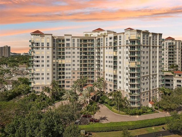 view of outdoor building at dusk