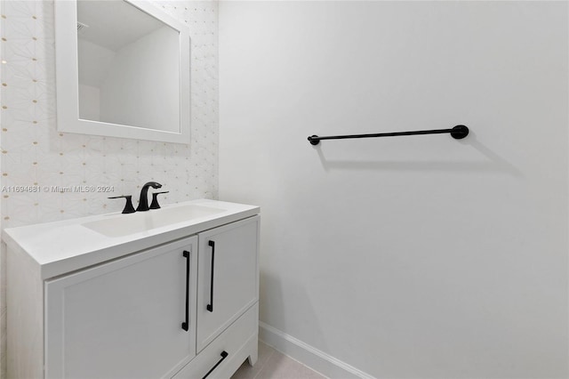 bathroom with vanity and tile patterned floors