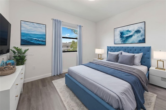 bedroom featuring wood-type flooring