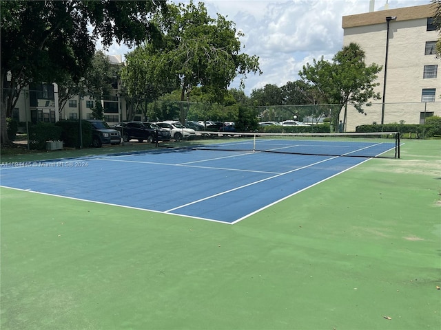 view of tennis court with basketball court