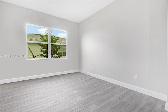 empty room with light wood-type flooring