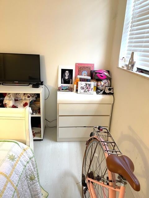 bedroom with light wood-type flooring