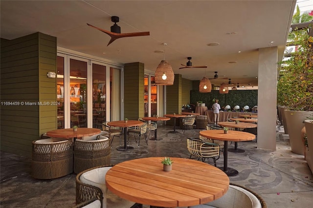 1100 W Ave Unit 918, Miami Beach, FL 33139 - view of patio featuring outdoor dining space and a ceiling fan