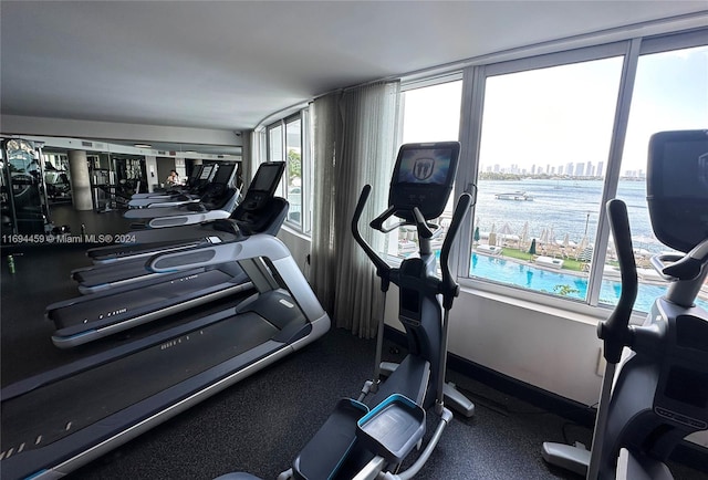 workout area with a water view