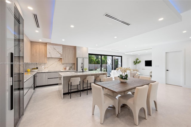 dining area featuring sink