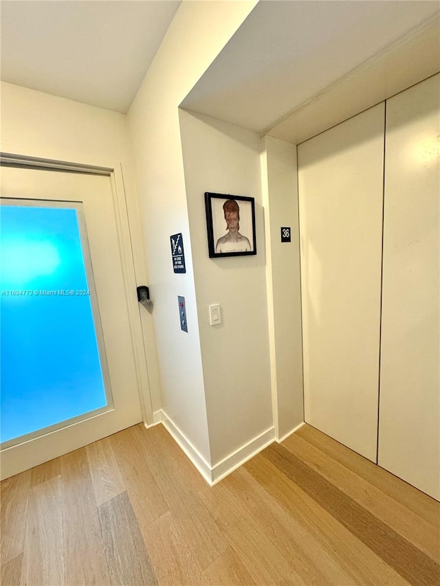 doorway featuring light hardwood / wood-style floors