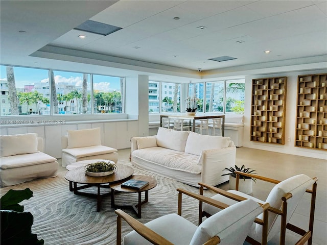 sunroom / solarium with a wealth of natural light and a city view