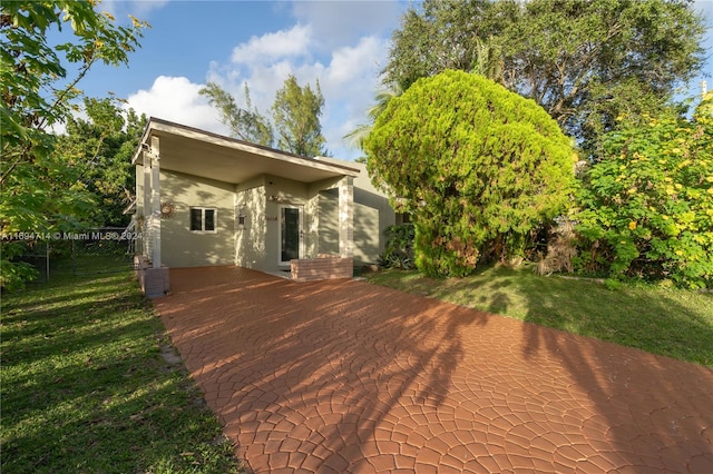 exterior space featuring a lawn