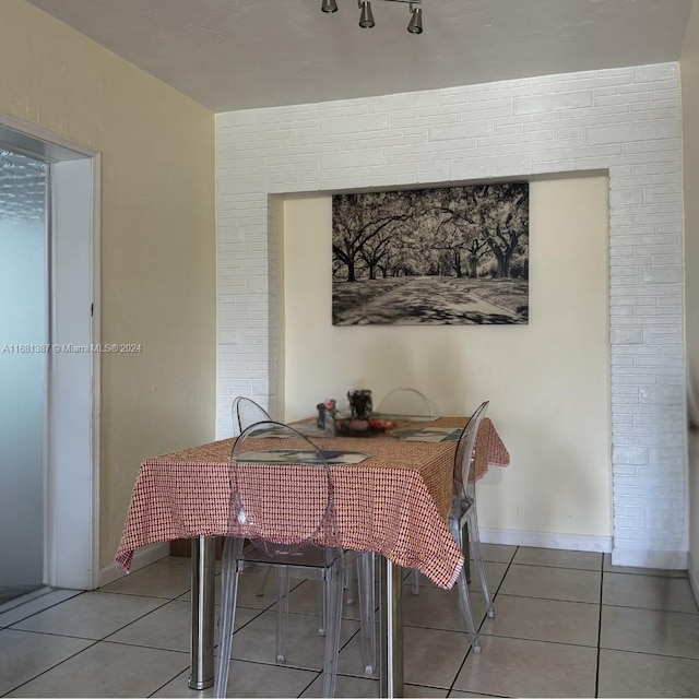 view of tiled dining space